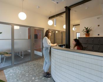 The reception in Camborne with bespoke tiled frontage and custom lockers made in black valchromat